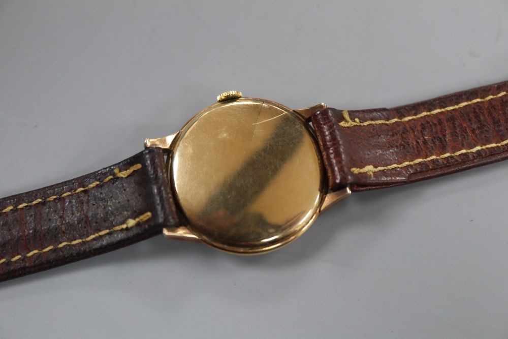 A gentlemans 1950s 9ct gold Cyma manual wind wrist watch